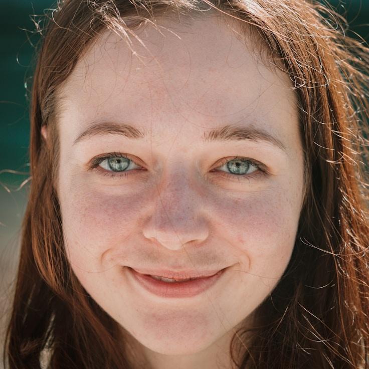 Kaveri Mehta, Lead Design Curator at Cool Planet Raft, reviewing corporate floral arrangements